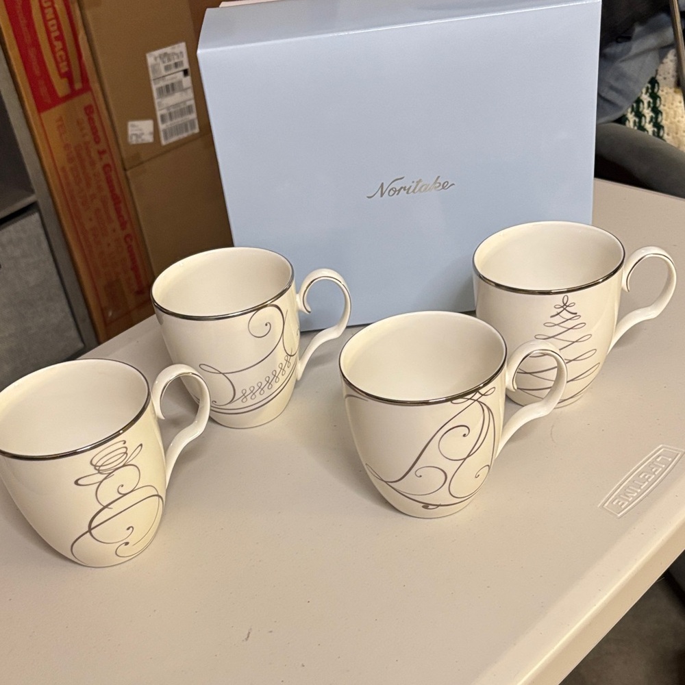 Noritake Platinum Wave Holiday Mugs